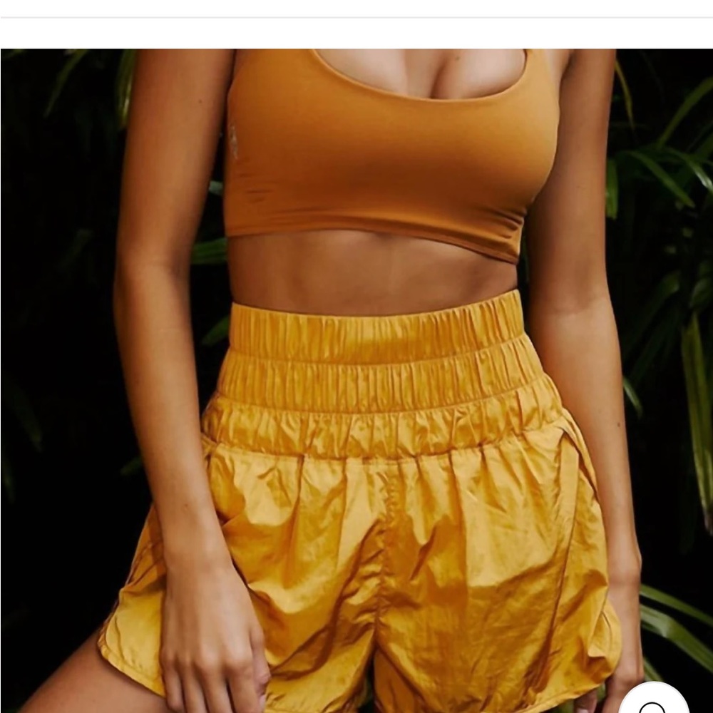 Free people way home short in varsity gold two in one athletic gold size M NWT